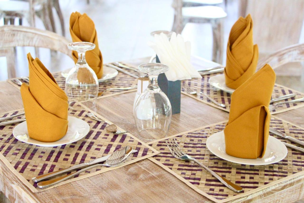 Nivadoo Resort Sigiriya Bagian luar foto A table set for fine dining