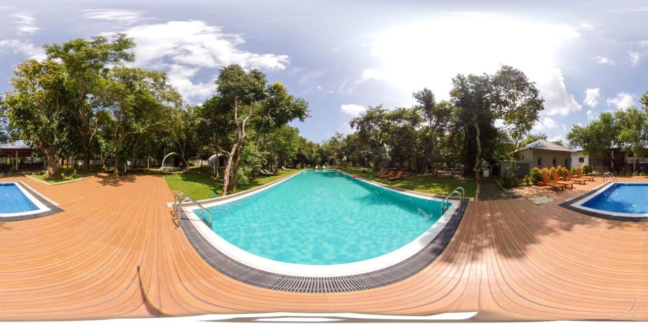 Nivadoo Resort Sigiriya Bagian luar foto A 360° image of a swimming pool