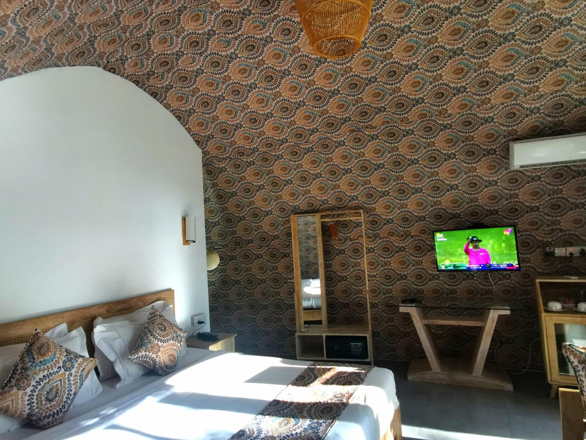 Nivadoo Resort Sigiriya Bagian luar foto A room at the hotel